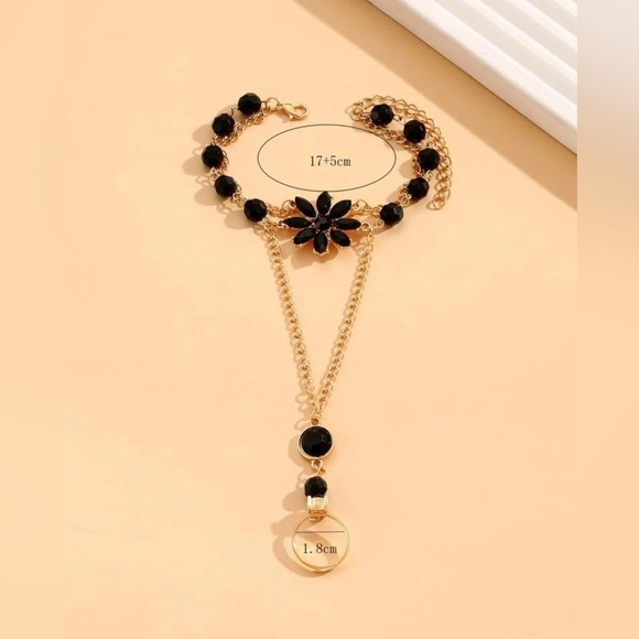 Elegant Black and Gold Floral Hand Chain - Picture 3 of 3